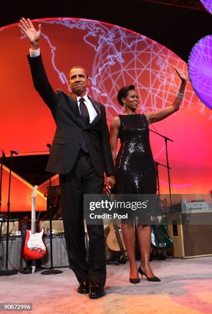President Barack Obama and First Lady Michelle Obama attend the Congressional Hispanic Caucus Institute dinner September 16, 2009 in Washington, DC....