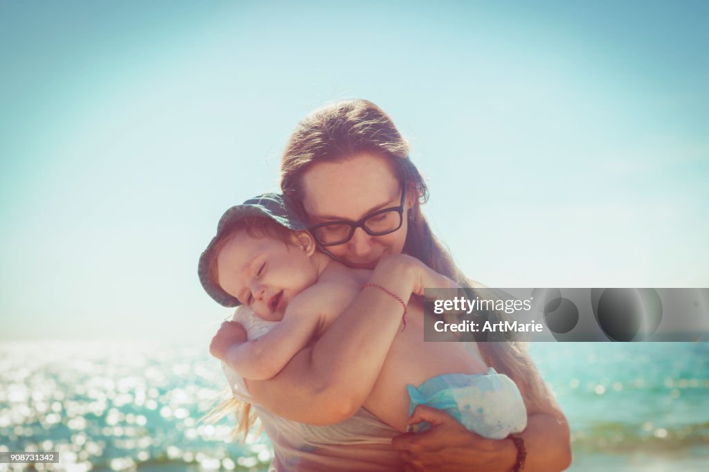 Mother and son on the beach