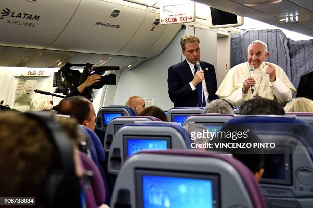 Pope Francis answers journalists during a press conference on board of the plane on January 22 during his flyback of a seven days trip to Chile and...