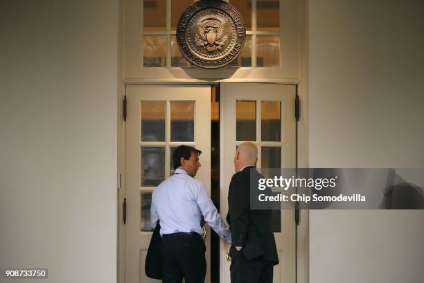 Deputy Press Secretary Hogan Gidley and White House Legislative Affairs Director Marc Short head back into the White House West Wing after talking...