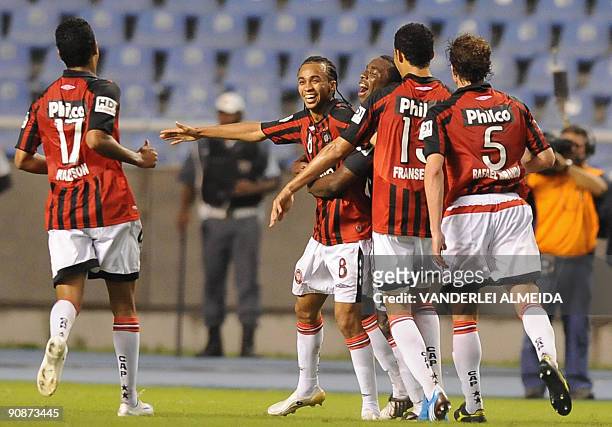 Wesley of Brazilian Atletico PR celebrates with teammates after scoring against Brazilian Botafogo during their Copa Sudamericana football match on...