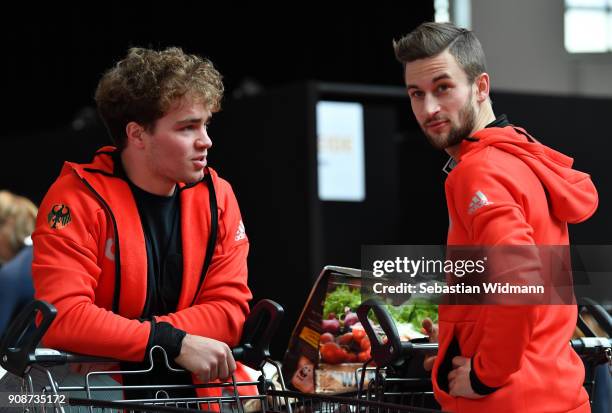 Stefan Baumeister and Markus Eisenbichler talk during the 2018 PyeongChang Olympic Games German Team kit handover at Postpalast on January 22, 2018...