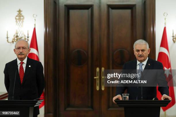 Turkey's Prime Minister Binali Yildirim and Turkey's main opposition Republican People's Party leader Kemal Kilicdaroglu give a joint press...