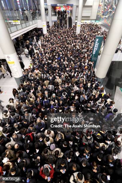 Passengers queue to enter the Keio Inokashira Line Shibuya Station due to snowfall on January 22, 2018 in Tokyo, Japan. The Japan Meteorological...