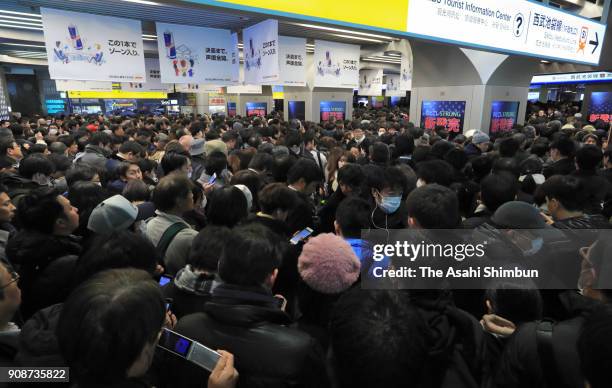 Passengers queue to enter the Seibu Ikebukuro Line Ikebukuro Station on January 22, 2018 in Tokyo, Japan. The Japan Meteorological Agency is...