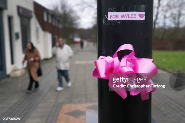Pink ribbons are left in tribute to murdered Mylee Billingham, aged eight, on street furniture in Brownhills High Street on January 22, 2018 in...