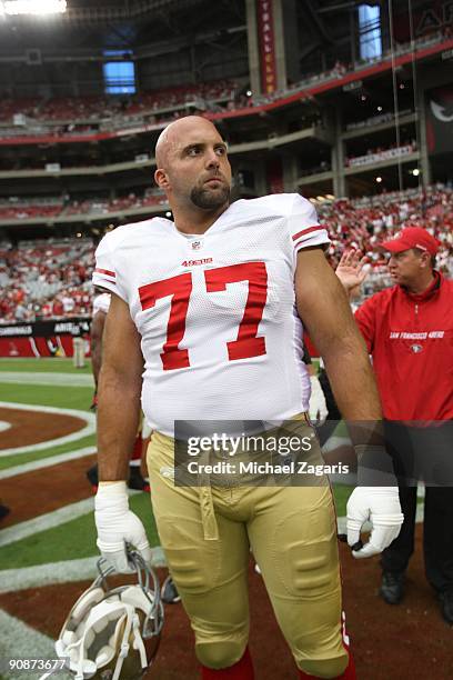 Tony Pashos of the San Francisco 49ers on the field prior to the NFL game against the Arizona Cardinals at University of Phoenix Stadium on September...