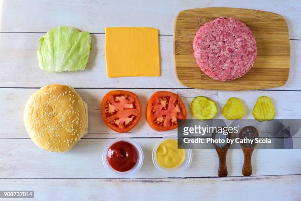 hamburger ingredients - condiment stock-fotos und bilder