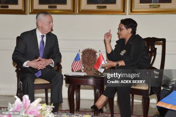 Indonesian Foreign Minister Retno Marsudi speaks to the US Secretary of Defence Jim Mattis during a meeting at the Foreign Ministry office in Jakarta...