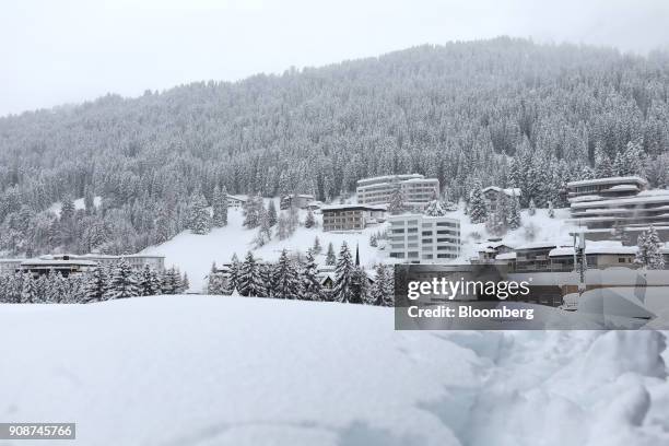 Snow covers buildings and trees after heavy snowfall in the town ahead of the World Economic Forum in Davos, Switzerland, on Monday, Jan. 22, 2018....