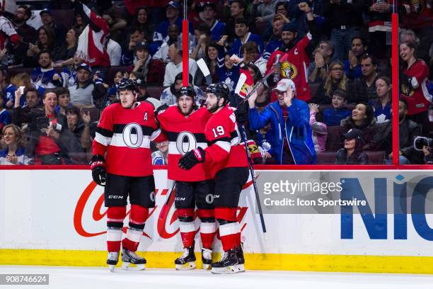Ottawa Senators Defenceman Dion Phaneuf and Ottawa Senators Center Derick Brassard join Ottawa Senators Left Wing Mike Hoffman to celebrate his goal...