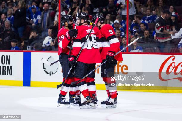 Ottawa Senators Defenceman Johnny Oduya and Ottawa Senators Left Wing Zack Smith celebrate a goal with teammates during second period National Hockey...