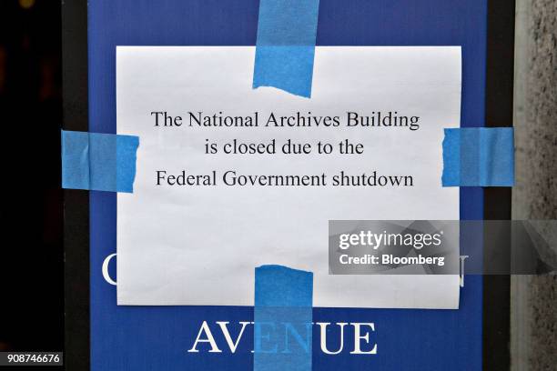 Sign indicating that the National Archives Building is closed due to the federal government shutdown stands outside the building in Washington, D.C.,...