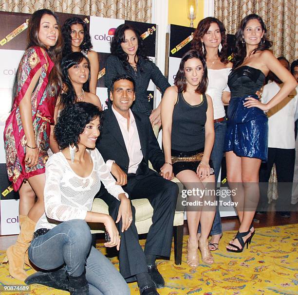 Bollywood actor Akshay Kumar poses for a picture with the female contenders of a television reality show Khatron Ke Khiladi-Level 2, Jesse Randhawa,...