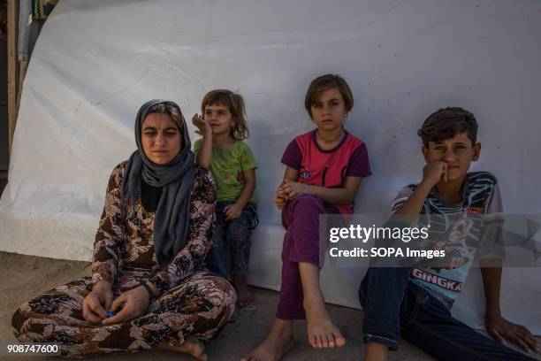 Tomas's mother and siblings. One of the kids is still missing and the family are still expecting to see her again. Thomas, an 11-year old Yazidi boy...