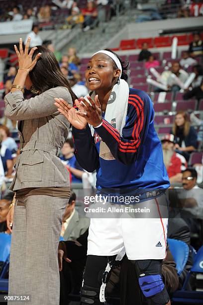 Cheryl Ford of the Detroit Shock cheers on her team from the bench during a game against the Atlanta Dream in Game One of the WNBA Eastern Conference...