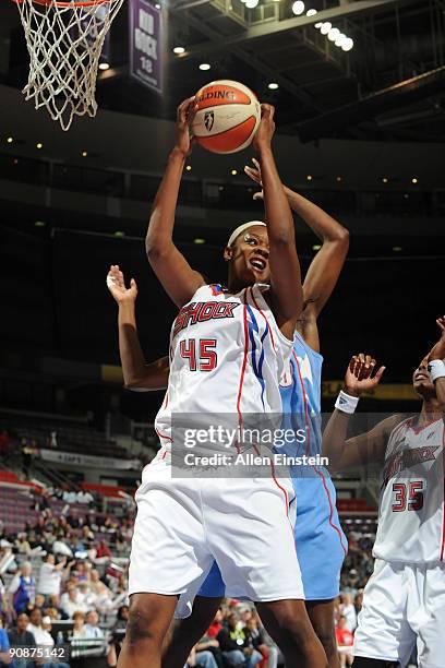 Kara Braxton of the Detroit Shock grabs a rebound in a game against the Atlanta Dream in Game One of the WNBA Eastern Conference Semi-Finals on...