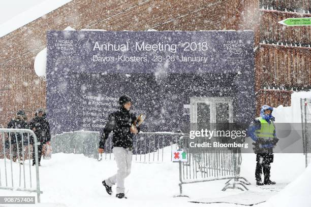 Heavy snow falls outside the Congress Center ahead of the World Economic Forum in Davos, Switzerland, on Monday, Jan. 22, 2018. World leaders,...