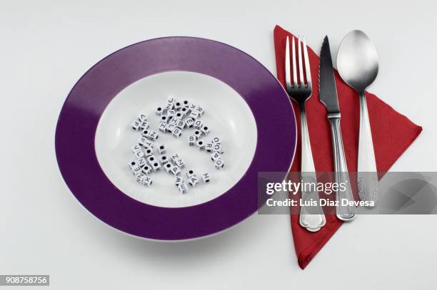 looking for words - alphabet soup stock pictures, royalty-free photos & images