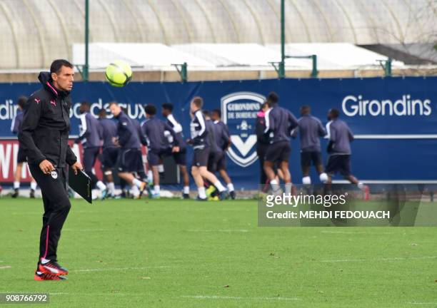 France's Ligue 1 football club Bordeaux Girondins Uruguayan new head coach Gustavo Poyet juggles a ball during his first training session as coach on...