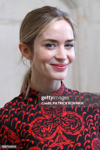 British-American actress Emily Blunt poses for a photocall prior to the Christian Dior's fashion show during the 2018 spring/summer Haute Couture...