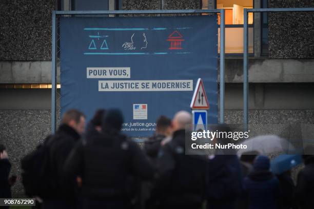 Protesters gather during a demonstration by prison guards where they blocked access to Fleury Merogis prison in France on January 22, 2018 during a...