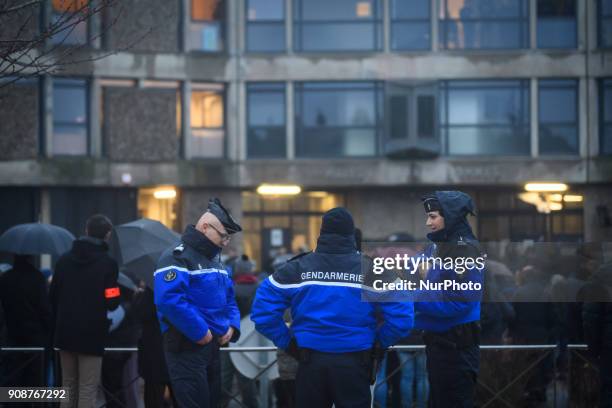 French policemen control protesters gather during a demonstration by prison guards where they blocked access to Fleury Merogis prison in France on...