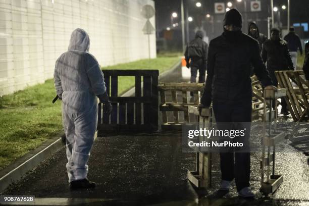 Jail workers lay down ablaze wood palets during a demonstration by prison guards where they blocked access to Fleury Merogis prison in France on...