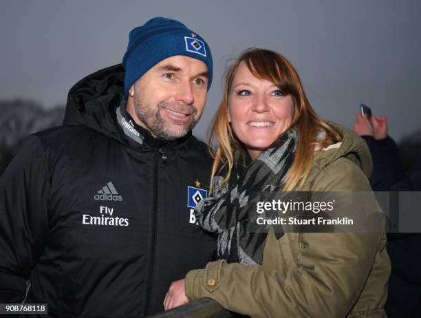 Bernd Hollerbach, new head coach of Hamburger SV poses for a picture with a fan after a training session of Hamburger SV at Volksparkstadion on...