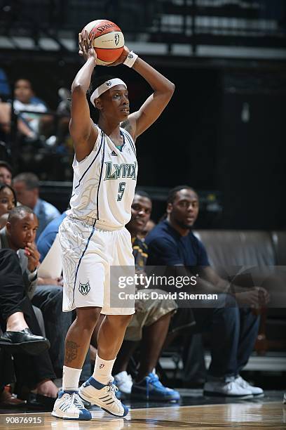 Roneeka Hodges of the Minnesota Lynx looks to move the ball against the Detroit Shock during the game on September 9, 2009 at the Target Center in...