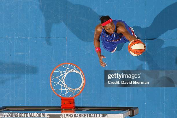 Cheryl Ford of the Detroit Shock grabs a rebound against the Minnesota Lynx during the game on September 9, 2009 at the Target Center in Minneapolis,...