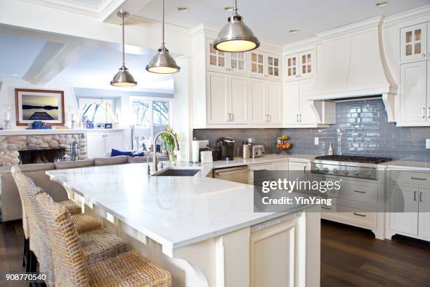 modern kitchen design with open concept and bar counter - kitchen worktop stock pictures, royalty-free photos & images