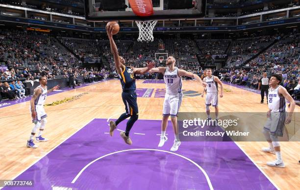 Donovan Mitchell of the Utah Jazz shoots a layup against George Papagiannis of the Sacramento Kings on January 17, 2018 at Golden 1 Center in...