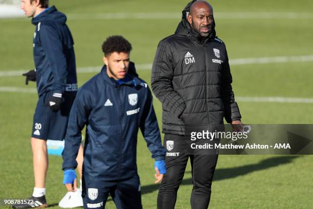 Darren Moore First Team Coach of West Bromwich Albion and Tyler Roberts during a West Bromwich Albion Training Session on January 22, 2018 in West...