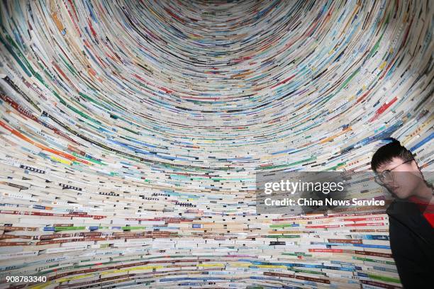 An eleven-meter-high tower of books stands at Xi'an University of Architecture and Technology on January 22, 2018 in Xi An, China. Artist Zhao Haitao...