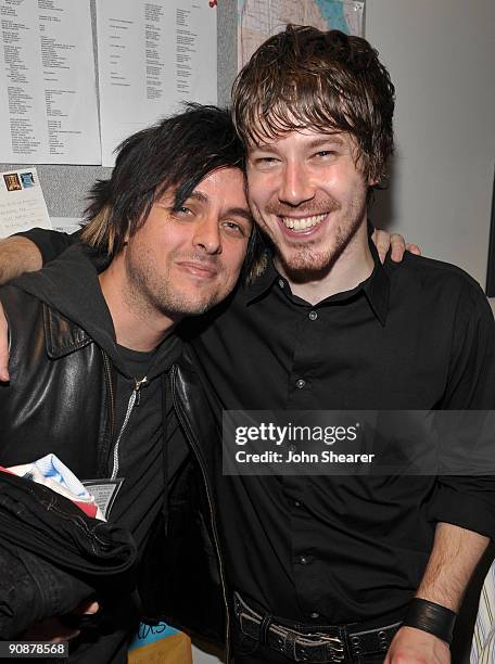 Musician Billie Joe Armstrong of Green Day and actor John Gallagher Jr. Backstage at the World Premiere of American Idiot Hosted By Levi's at the...