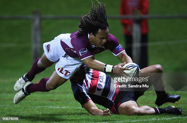 Pehi Te Whare of Southland dives in to score a try during the Air New Zealand Cup match between Counties Manukau and Southland at Growers Stadium on...