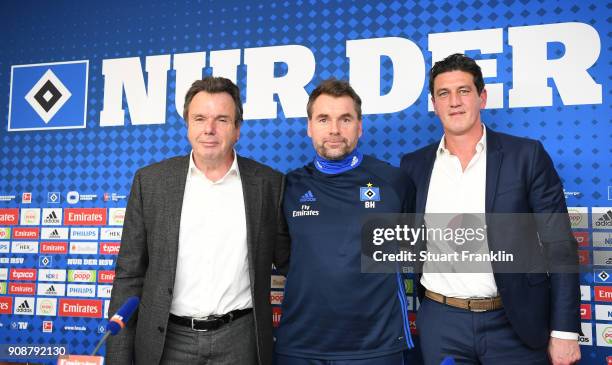 Heribert Bruchhagen, manager of Hamburg, Bernd Hollerbach, new head coach of Hamburger SV and Jens Todt, sports director of Hamburg pose for a...