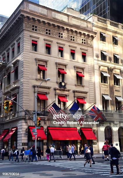 Flags fly from the Cartier Building on Fifth Avenue in New York City. Now known as the Cartier Building, the Manhattan landmark was originally the...