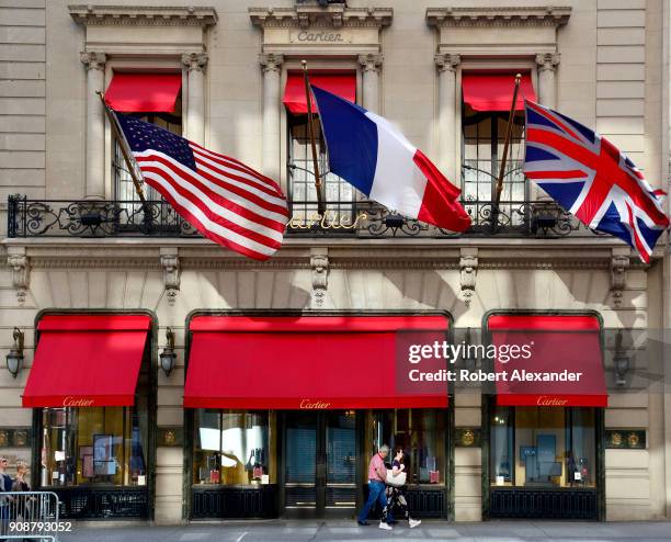 Flags fly from the Cartier Building on Fifth Avenue in New York City. Now known as the Cartier Building, the Manhattan landmark was originally the...