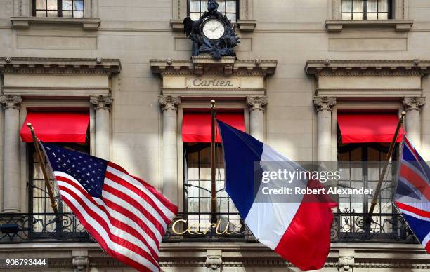 Flags fly from the Cartier Building on Fifth Avenue in New York City. Now known as the Cartier Building, the Manhattan landmark was originally the...