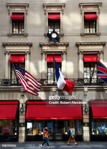 Flags fly from the Cartier Building on Fifth Avenue in New York City. Now known as the Cartier Building, the Manhattan landmark was originally the...