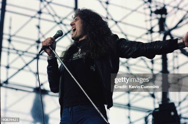 English singer David Coverdale performing with heavy metal group Whitesnake at the Monsters Of Rock festival at Castle Donington racetrack, 22nd...