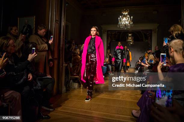 Model walks the runway during the Stand show on the second day of Stockholm Fashion Week at the Grand Hotel on January 22, 2018 in Stockholm, Sweden.