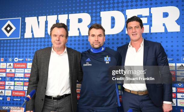 Heribert Bruchhagen, manager of Hamburg, Bernd Hollerbach, new head coach of Hamburger SV and Jens Todt, sports director of Hamburg pose for a...