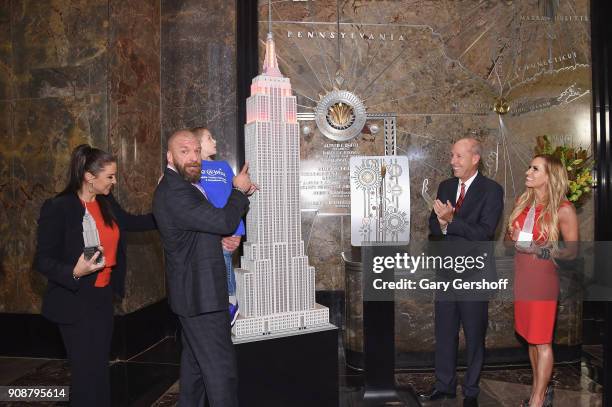 Chief Brand Officer Stephanie McMahon, WWE Champion and Executive Vice President of Talent, Live Events and Creative, Paul 'Triple H' Levesque,...