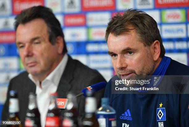 Bernd Hollerbach, new head coach of Hamburger SV talks to the media as Heribert Bruchhagen, manager of Hamburger SV looks on during a press...