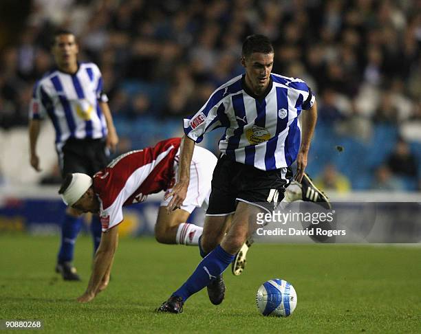 Darren Potter of Sheffield Wednesday moves away from Gary O'Neil during the Coca- Cola Championship match between Sheffield Wednesday and...