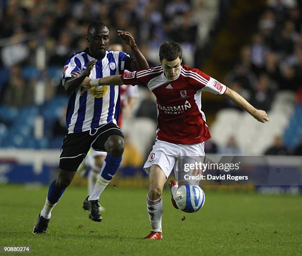 Adam Johnson of Middlesbrough moves away from Jermaine Johnson during the Coca- Cola Championship match between Sheffield Wednesday and Middlesbrough...