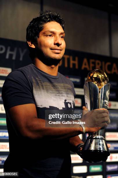 Sri Lanka captain Kumar Sangakkara holds the ICC Champions trophy during the ICC Champions Trophy captains' press conference at the Sandton Sun on...